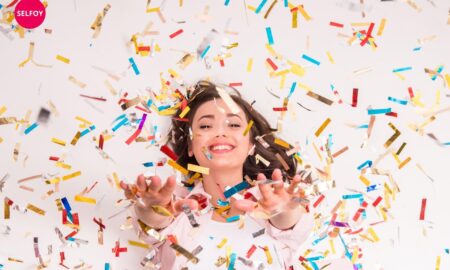 Girl is cheering up and showing Self esteem is a collective product of life experiences