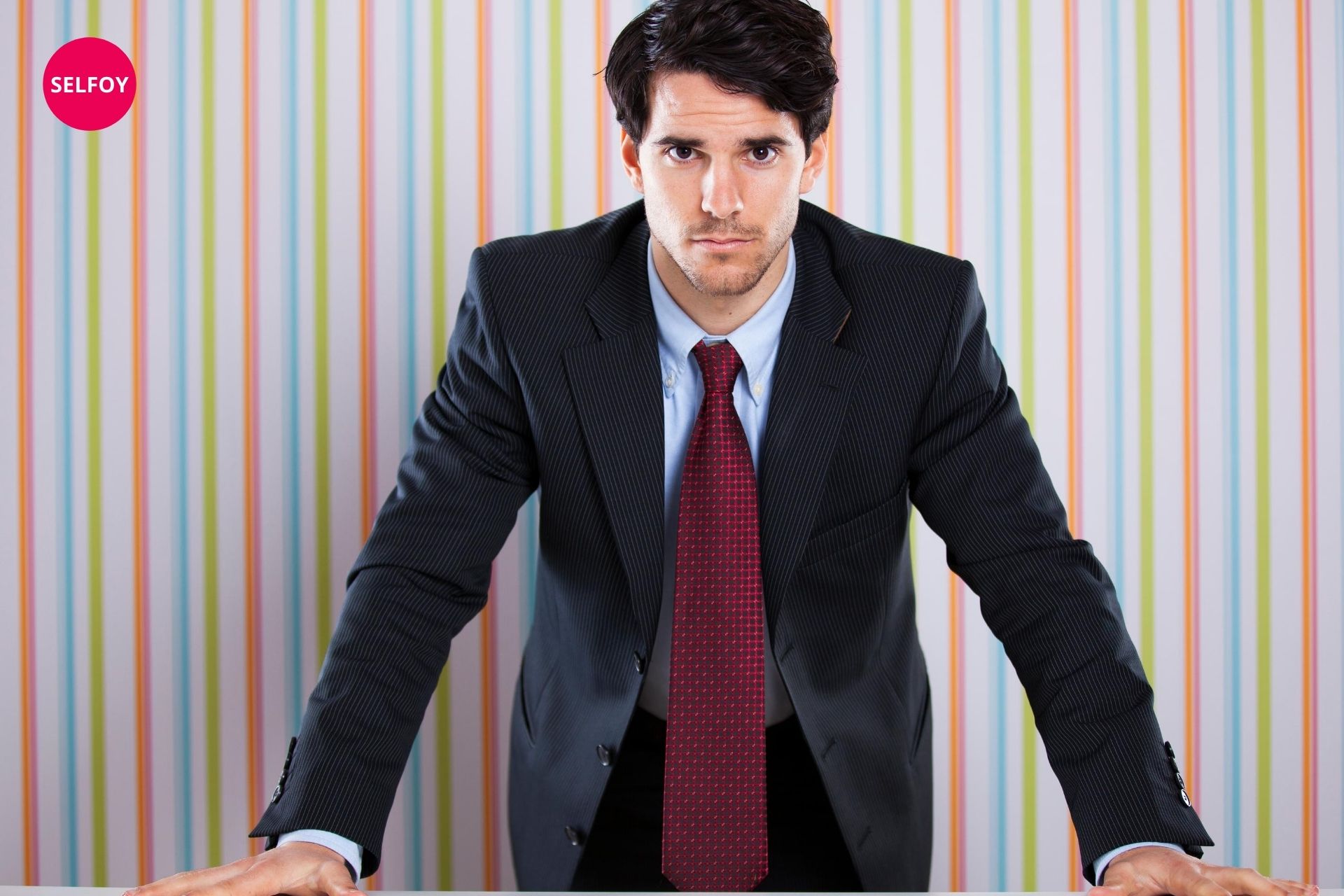 Gentleman wearing black suit and he is one of attractive guys with low self esteem.