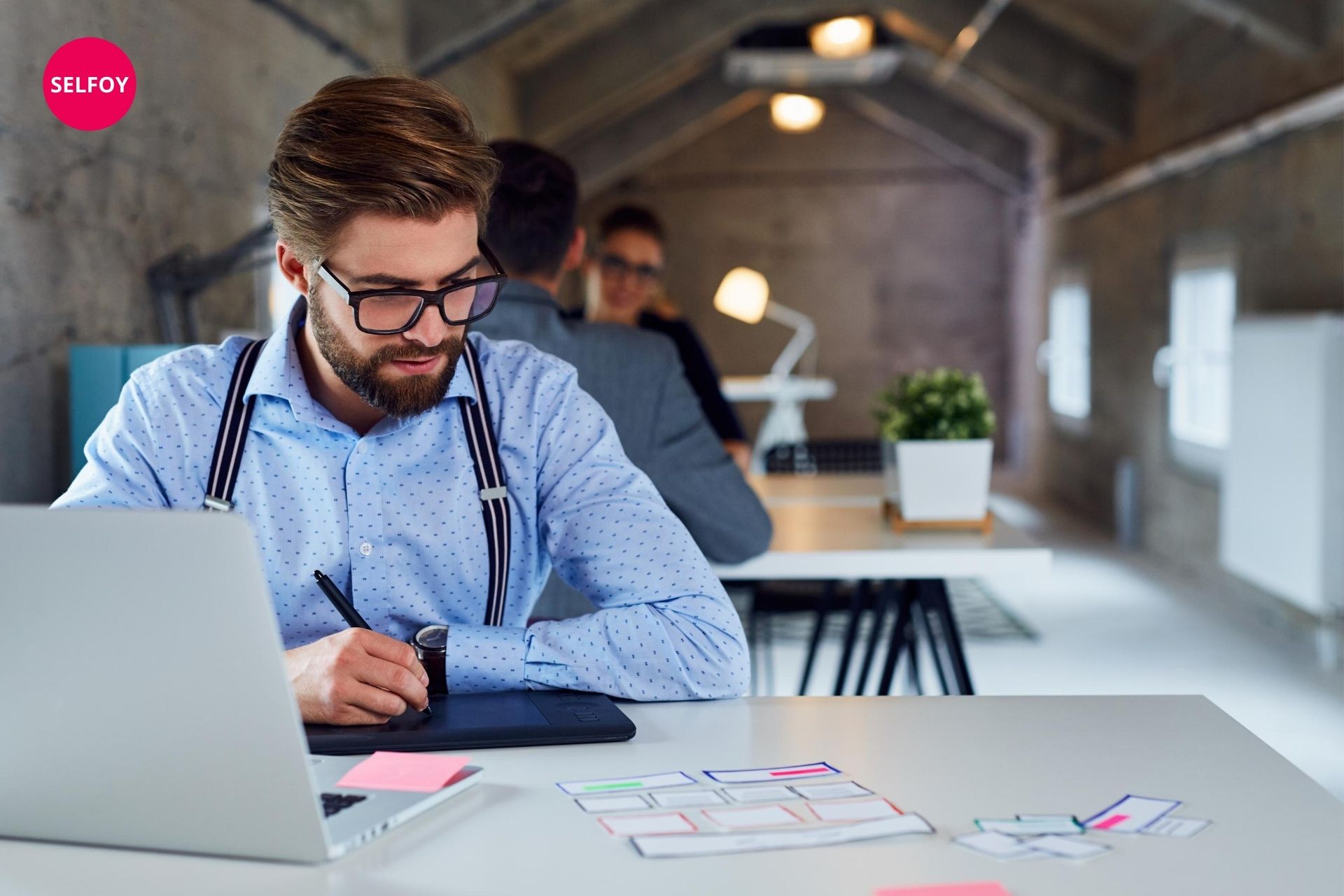 Man wearing black goggle working on laptop and checking with does autodidact work with self care