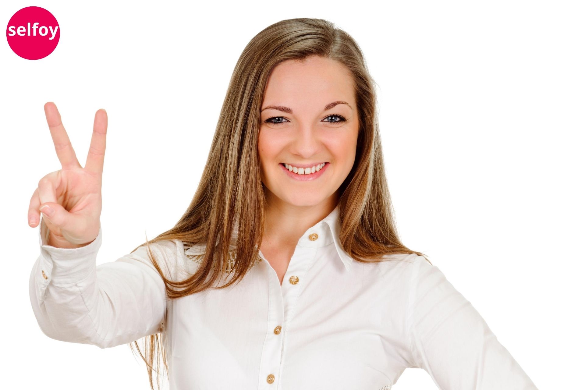 Woman smiling and showing win signals by showing her two fingers