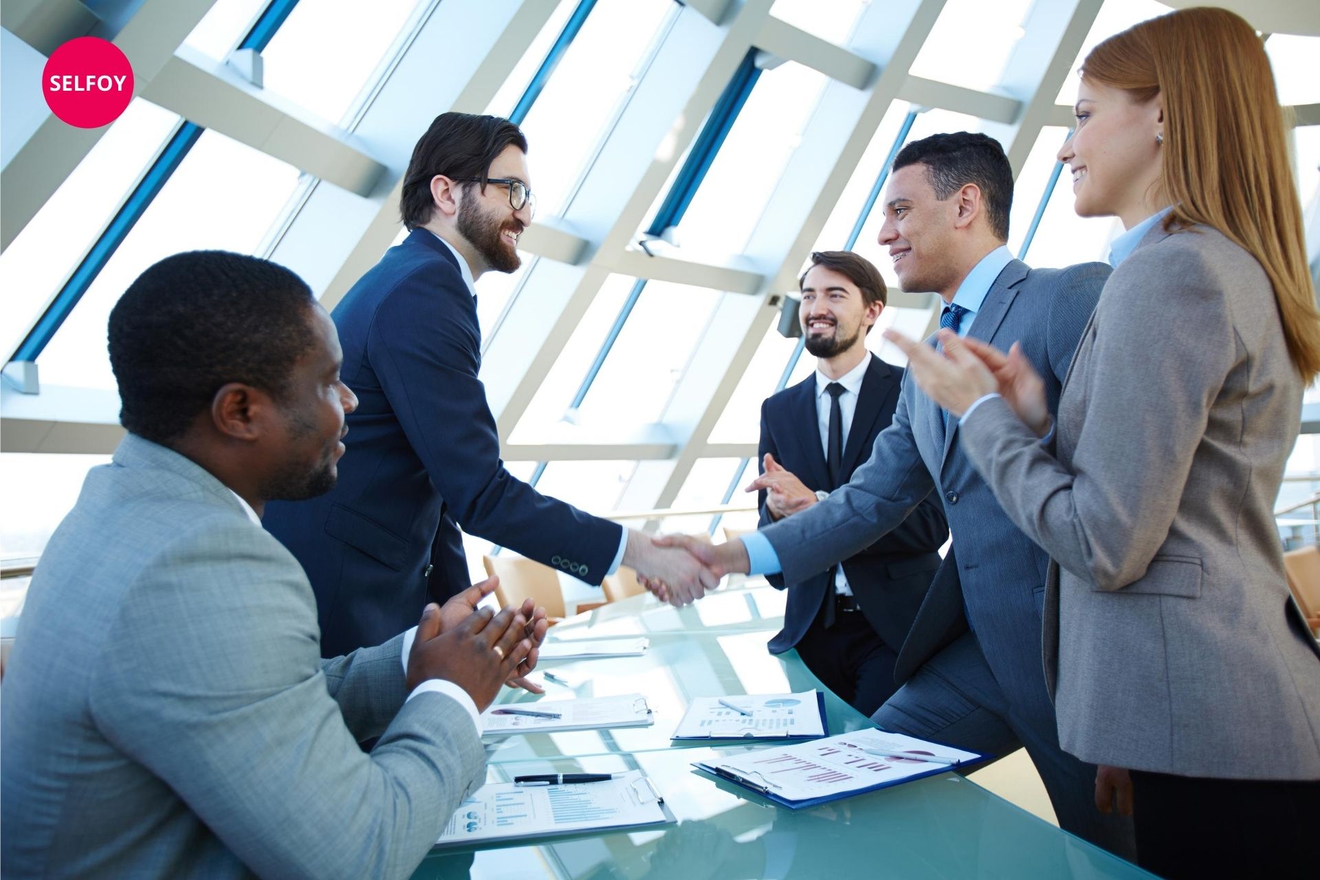 men are hand shaking of each other and showing characteristics of self confidence