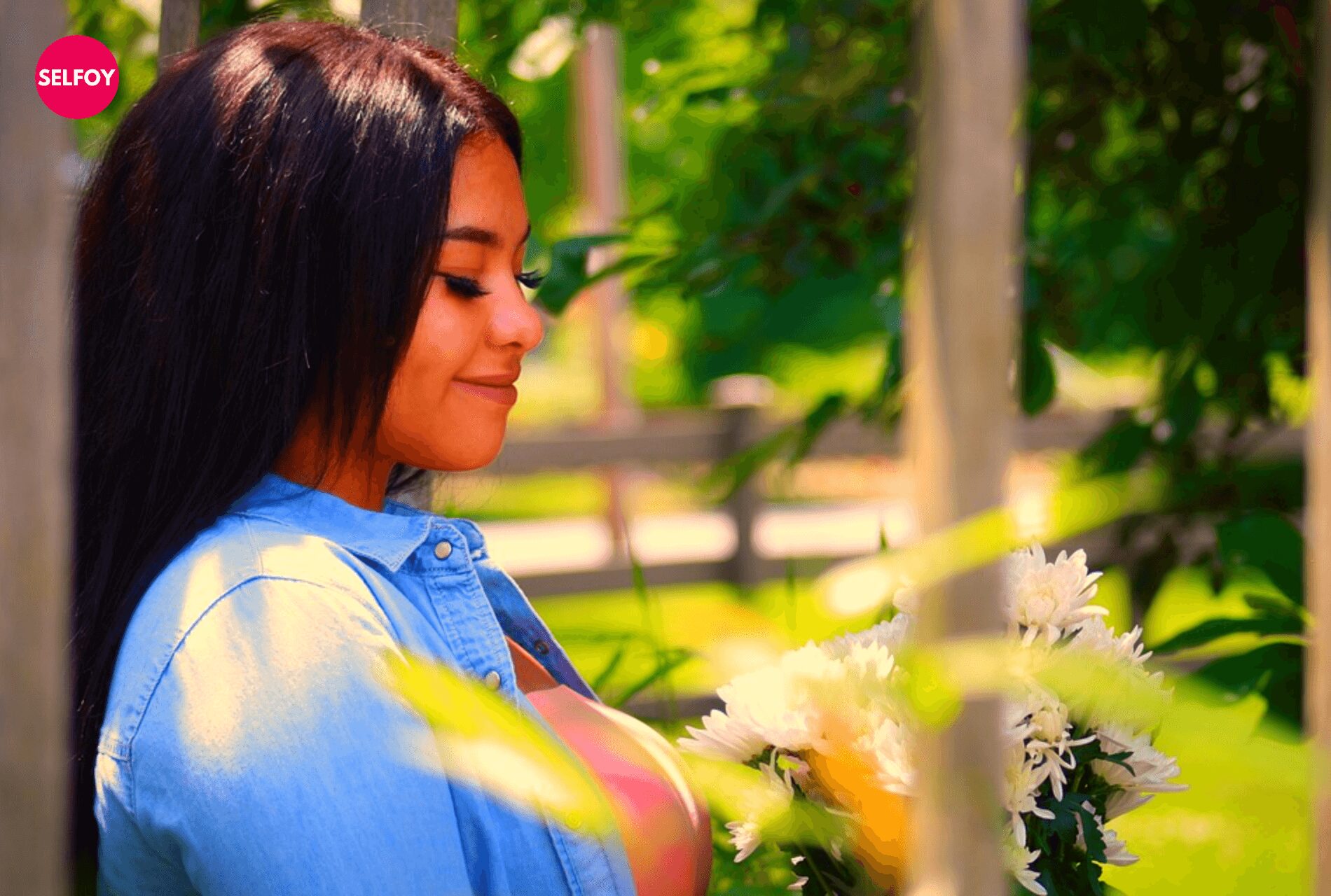  A-girl-show-self-love-by-smiling-in-the-greenery