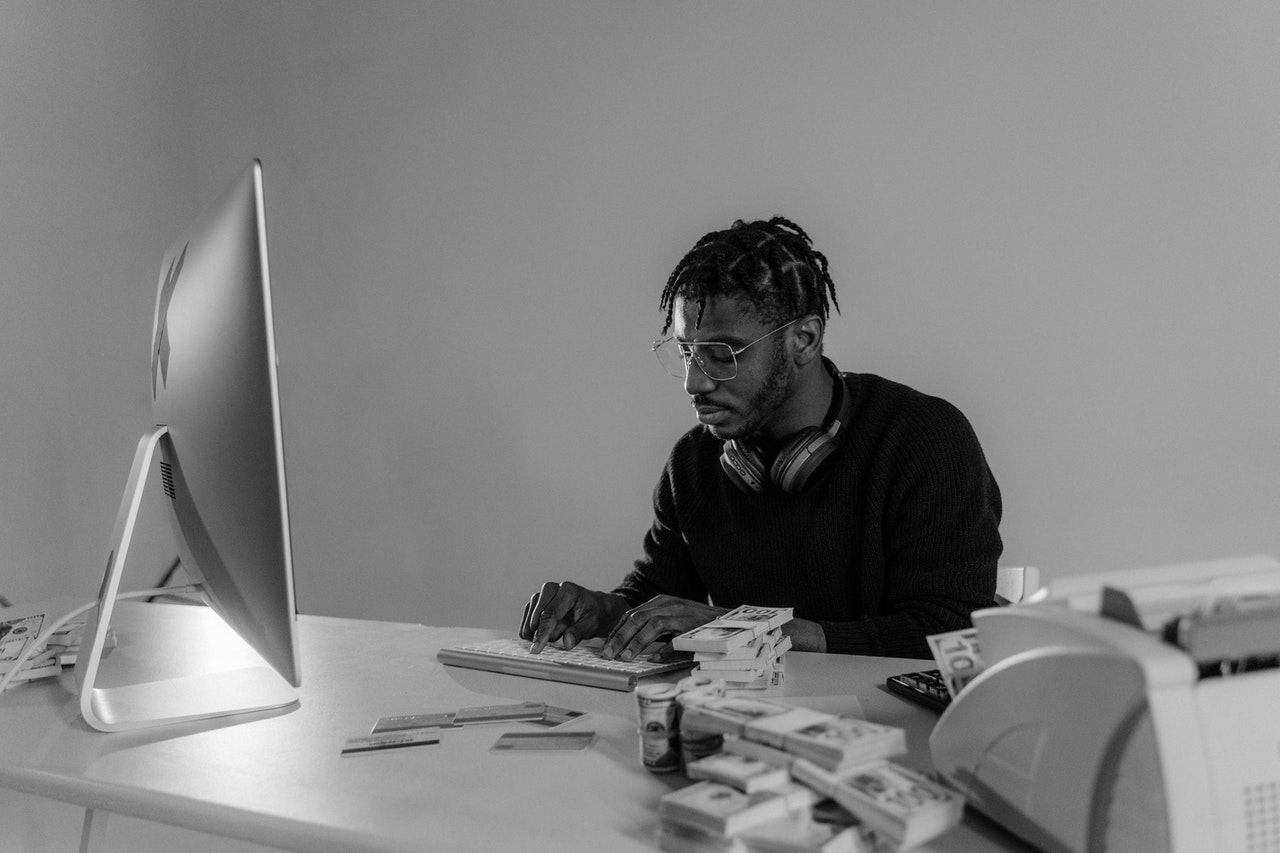 Black man working on a laptop